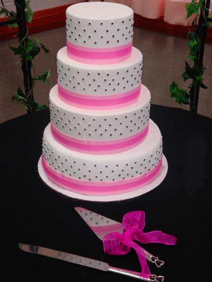 The cake was a white confetti cake with pink and black confetti
